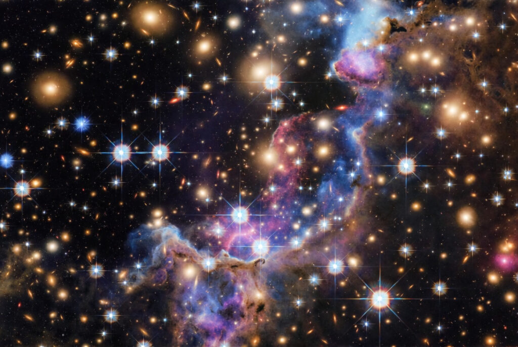 James Webb Space Telescope deep-field image showing colorful early universe galaxies, nebulae, and star clusters with cosmic dust pillars